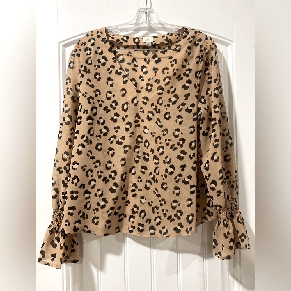Brown animal print blouse